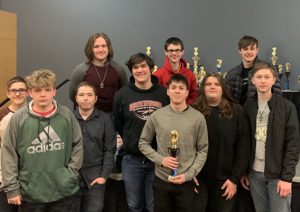 chess team holding a trophy