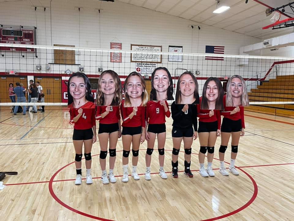volleyball players with big head signs