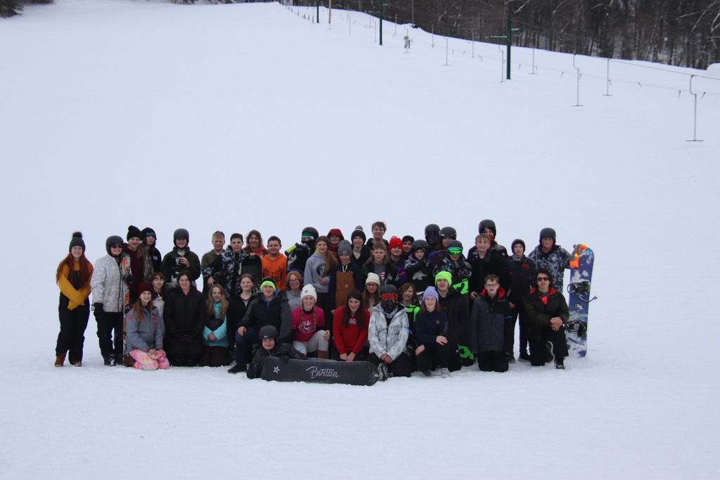 large group of students on ski hill