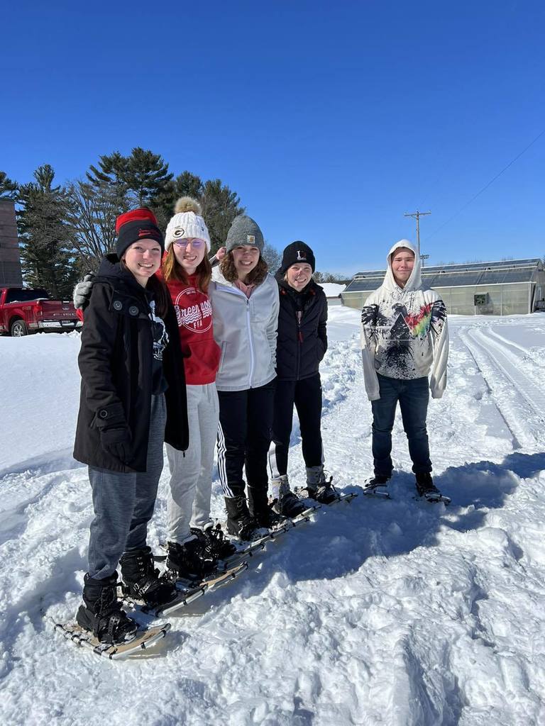 five students on snowshoes